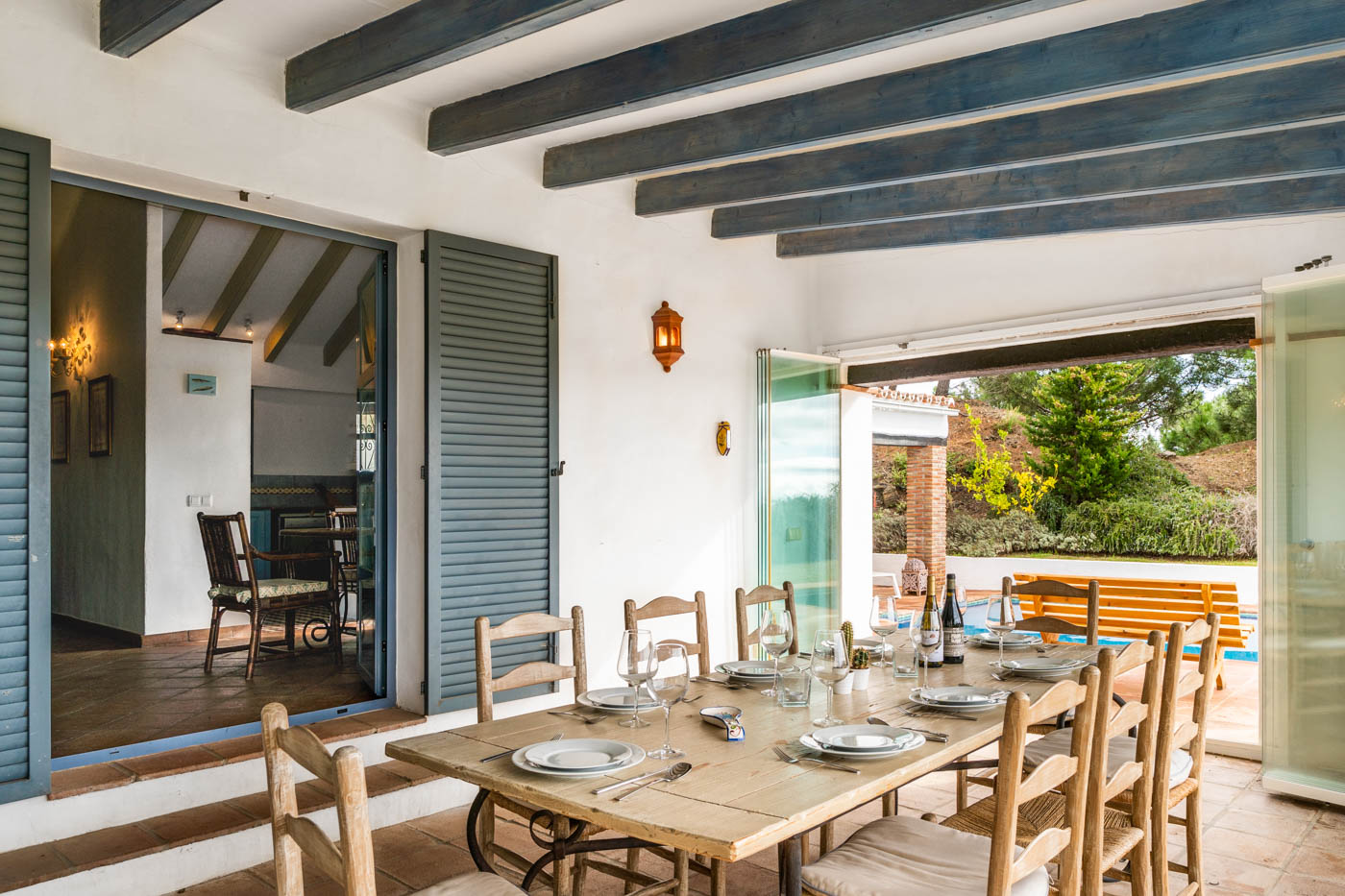 Porch / conservatory opening to pool area and gardens