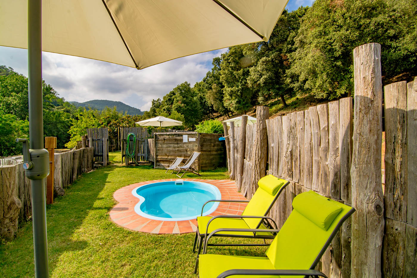 Fenced paddling pool is 10 metres from main pool