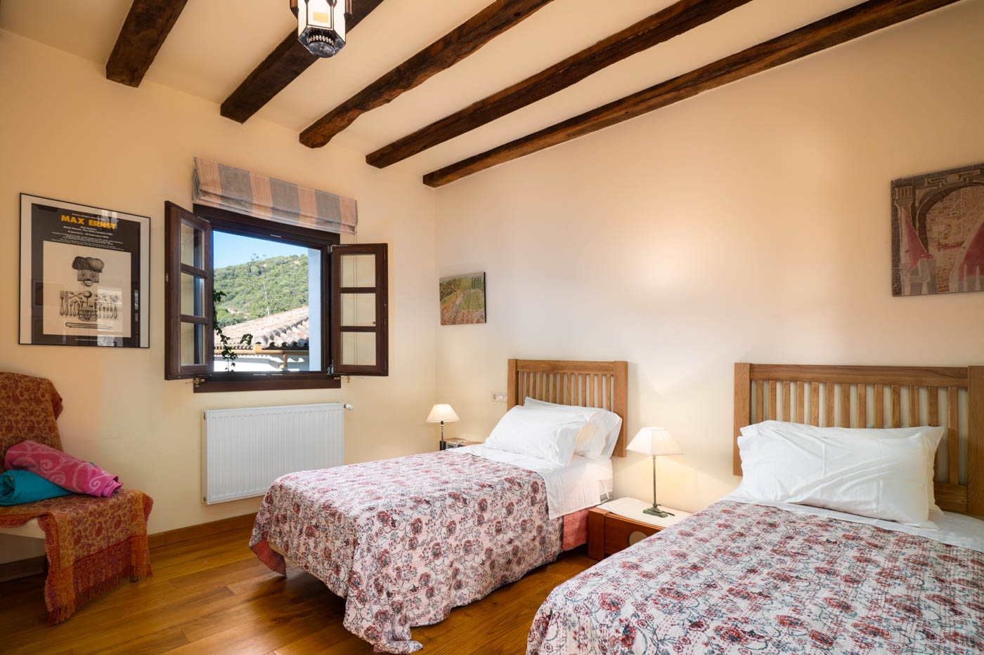 Twin bedded room accessed from central courtyard