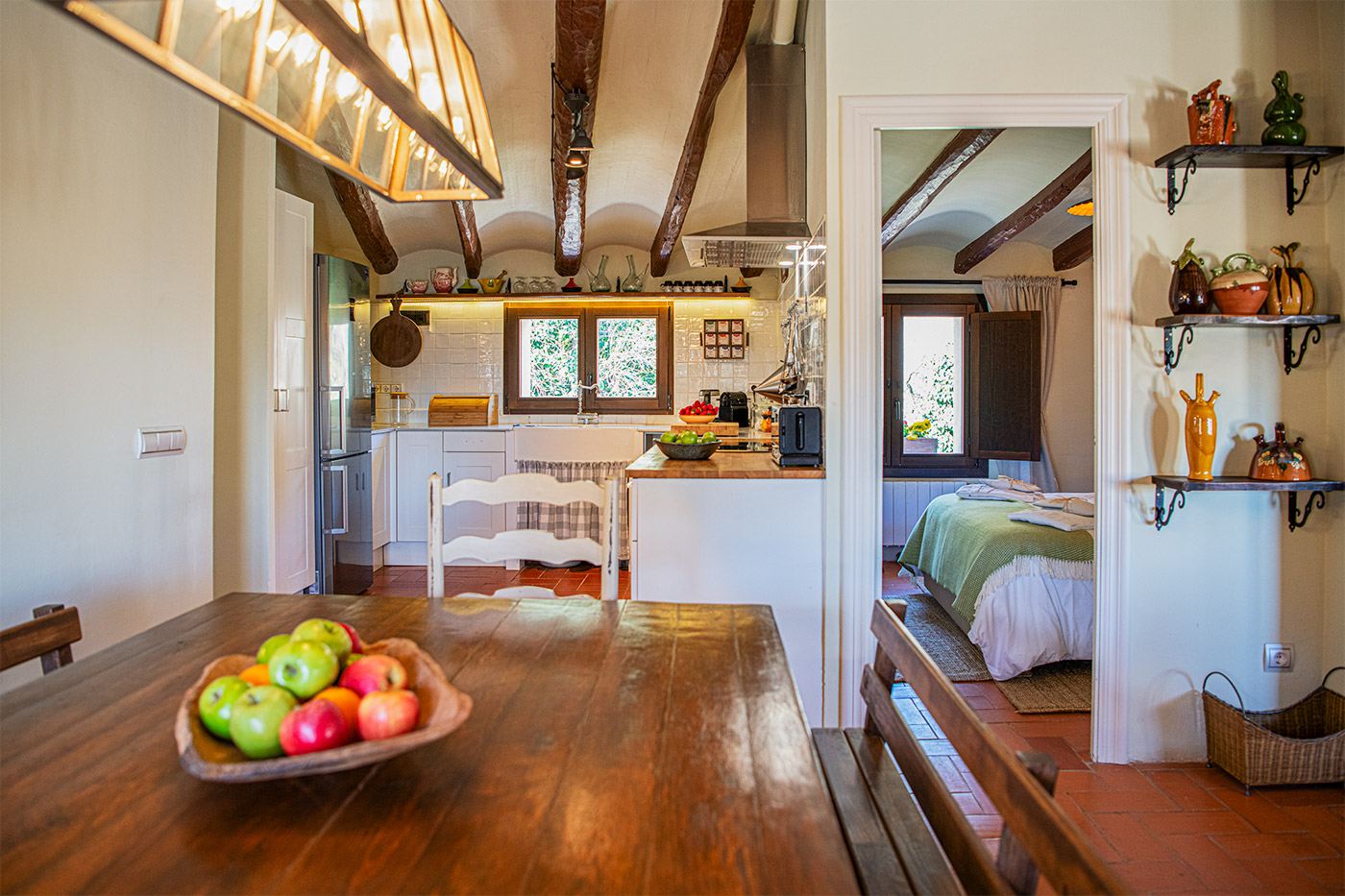 Dining area with well equipped kitchen