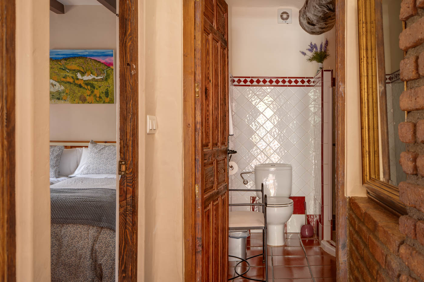 Bedroom next to bathroom