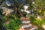 A few steps to more terraces and pool area