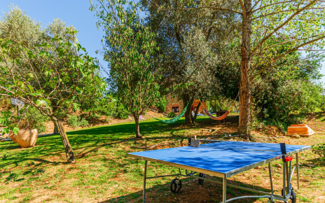 Table tennis next to parking area