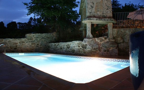 The pool illuminated by night