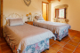 Bedroom 1 has twin beds