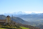 Villlage church and Picos de Europa