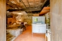 The restored mill is a bedroom on lower floor