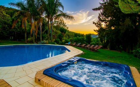 Outdoor heated pool with jacuzzi