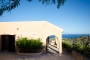 Entering your villa from shaded parking area