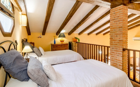 Mezzanine / gallery room overlooks living areas