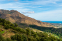 You are located between mountains and the sea