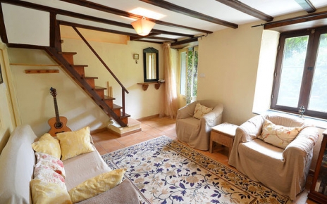 Living area with steps to first floor