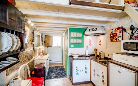 Kitchenette with foldable dining table for 2