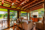 Indoor space blends with shaded terraces