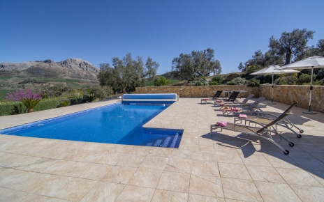 Pool area with table tennis, parasols and sunloungers