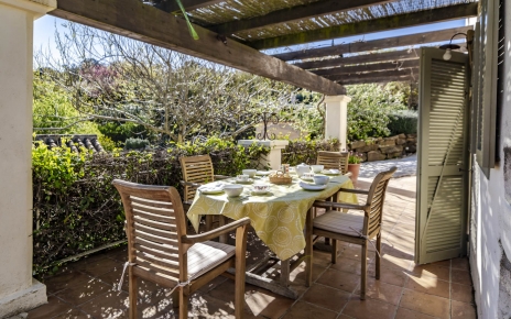 This shaded furnished terrace is next to kitchen