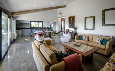 Living / dining area with kitchen at the end