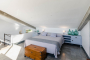The master bedroom bed is king size