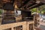 Barbecue area includes wood oven