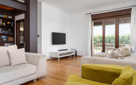 Living area with doors to furnished porch