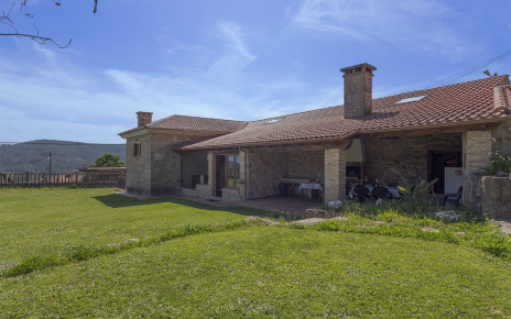 Porch next to gardens and pool area